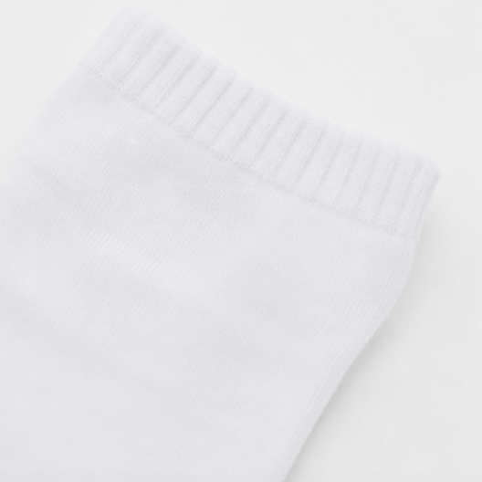 White fabric texture with a subtle pattern
