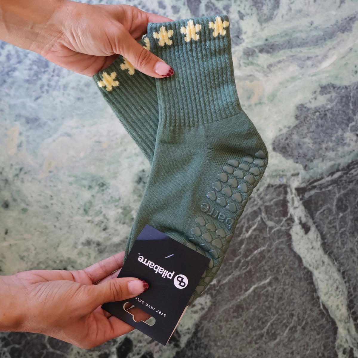 green and yellow flower grip socks