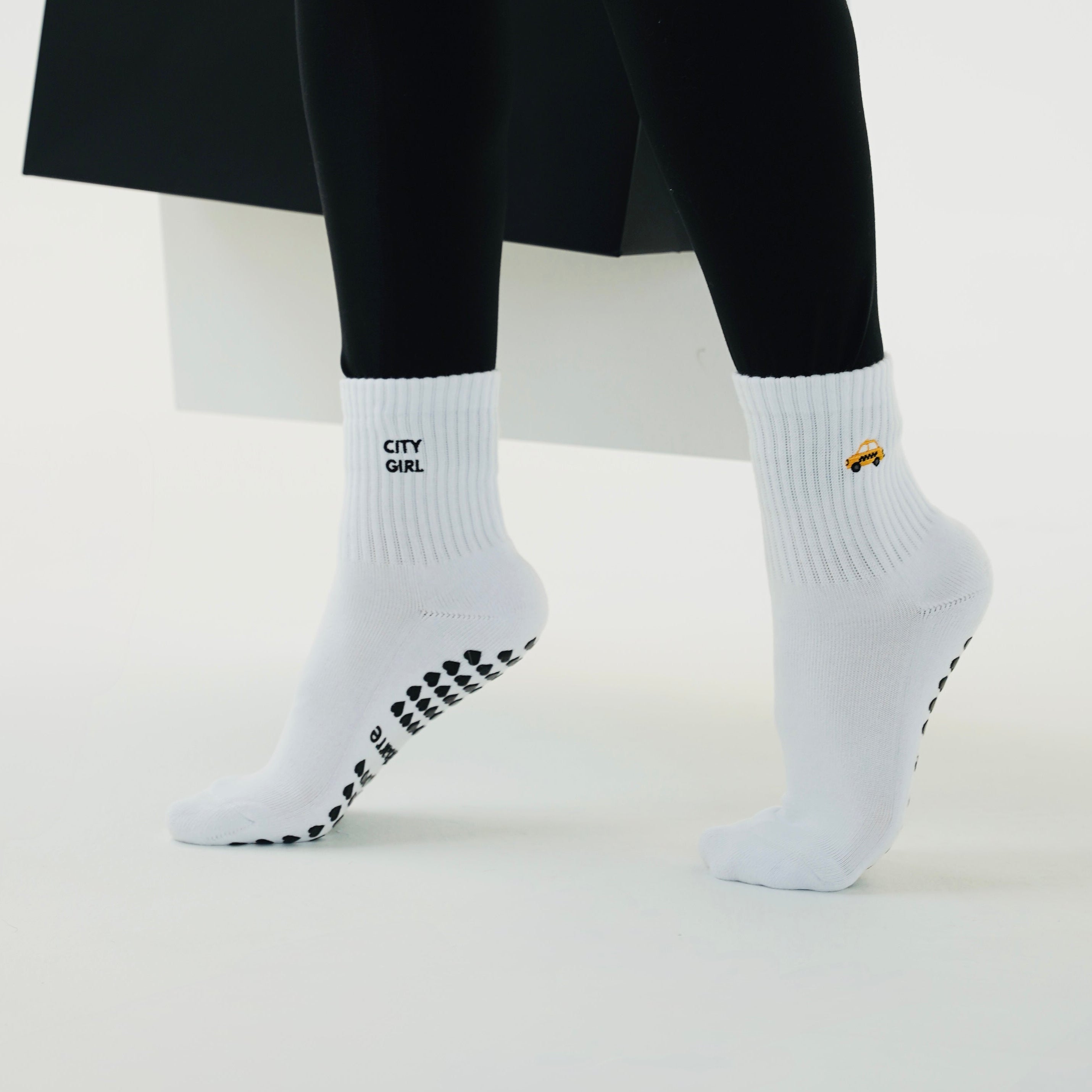 CIty girl grip socks for pilates. NYC pilates socks. Pilates socks with a taxi