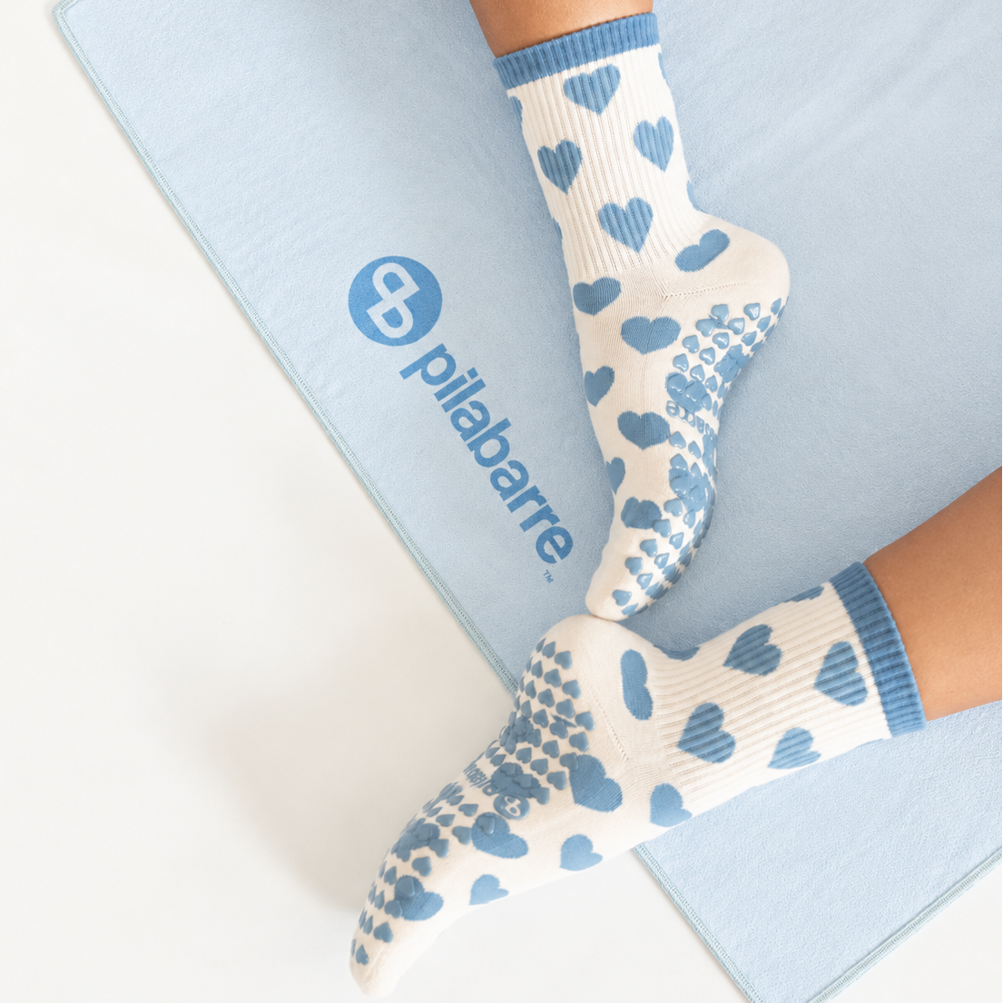 blue heart grip socks and blue mat towel