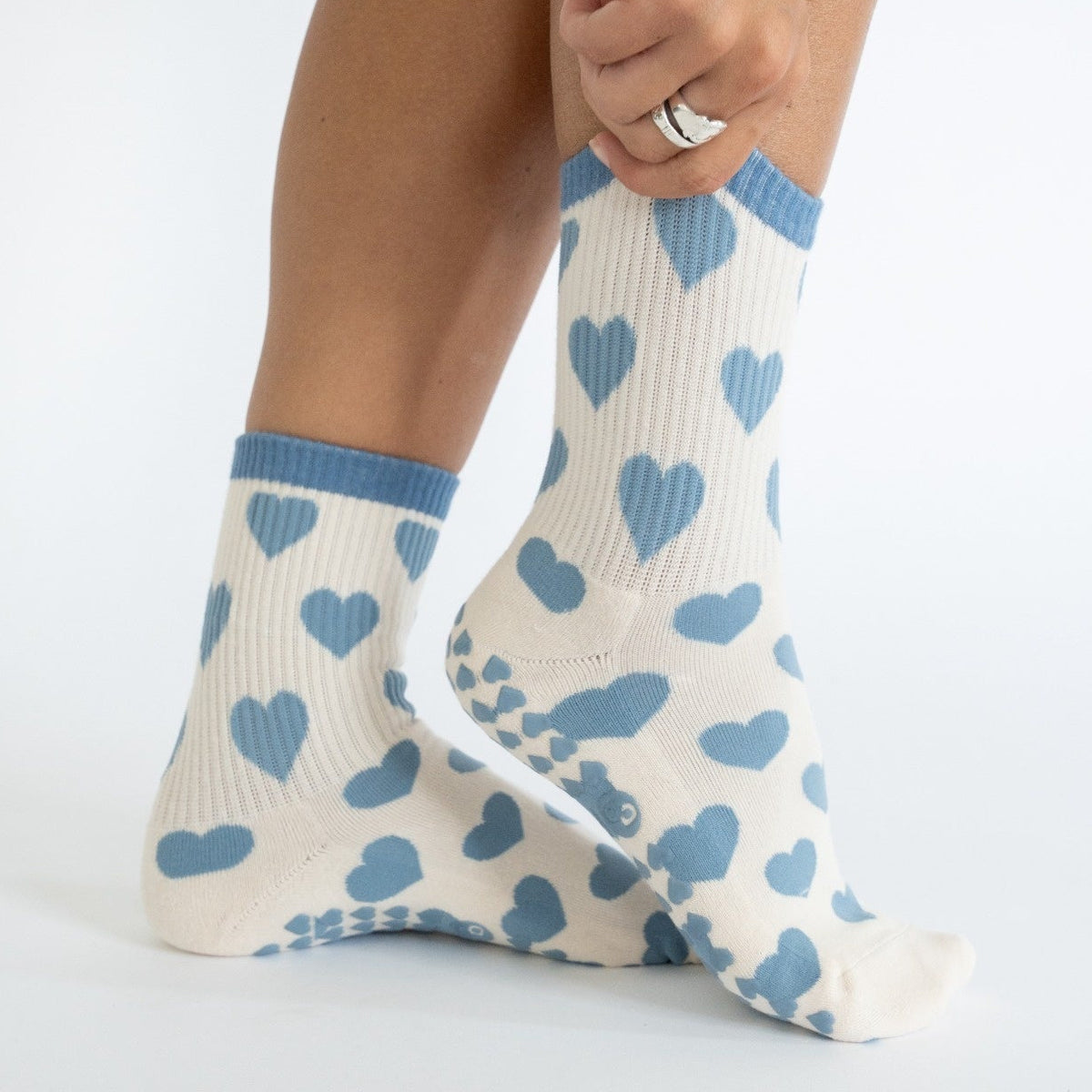 cream and blue heart grip socks