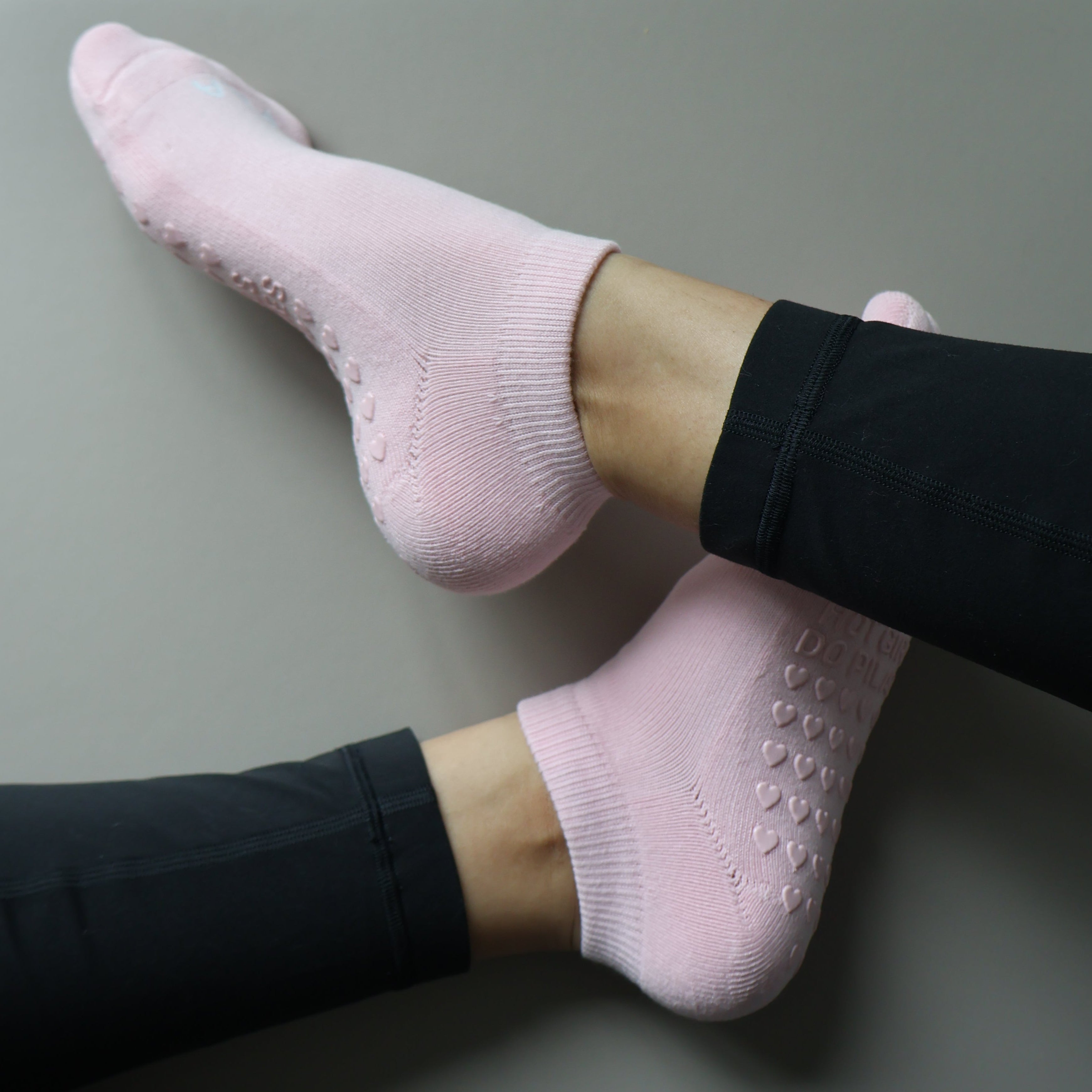 hot girls do pilates - low pink grip socks for pilates