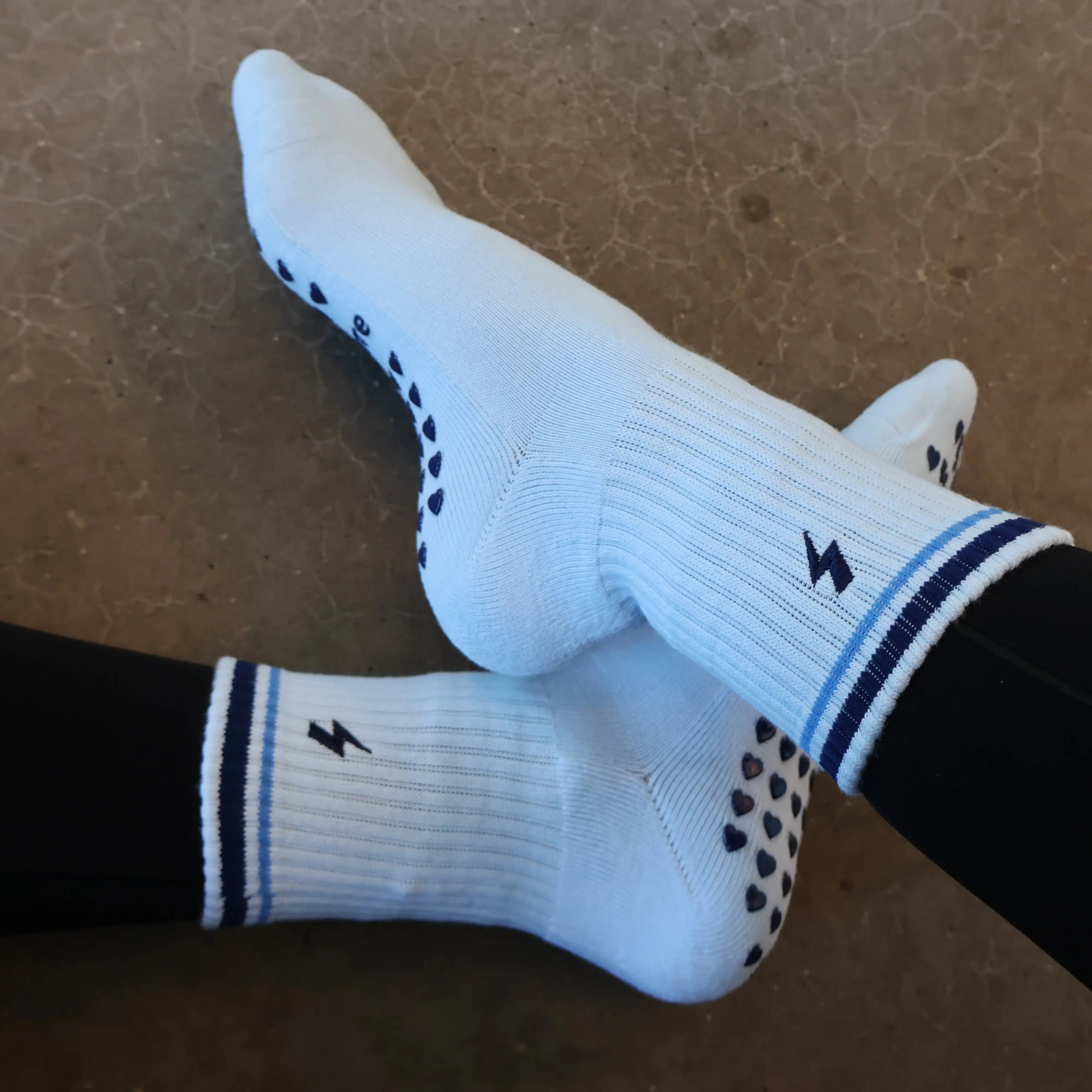 lightning bolt blue grip socks for reformer pilates class
